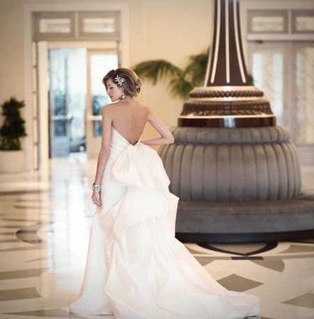 Bride by lobby clock