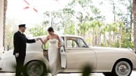 bride getting out of wedding car