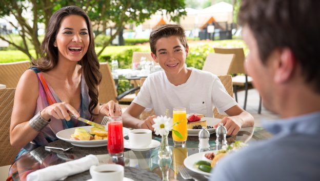 Orlando Breakfast Restaurants Oscar S At Waldorf Astoria Waldorf Waffles Family Eating Breakfast At Oscar S